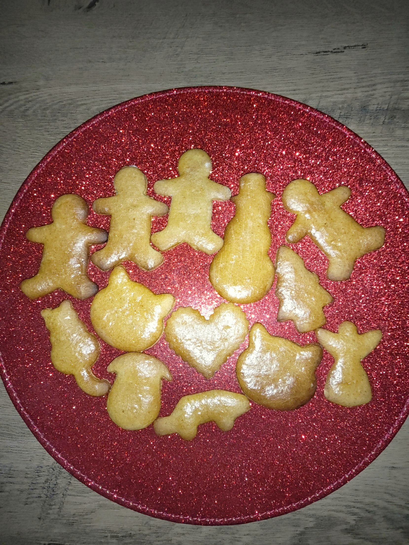 Homemade honey gingerbread biscuits on a festive plate